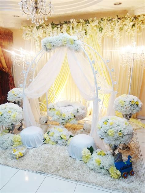 Flower decoration for naming ceremony. Cinderella / pumpkin cradle. Decoration baby cradle for naming ceremony. Pelamin buaian berendoi ...
