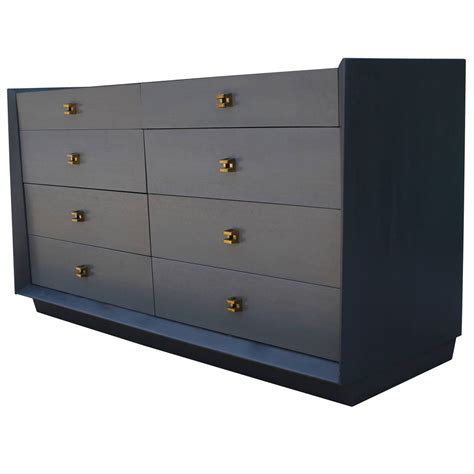 Maybe you would like to learn more about one of these? Sculptural Two-Tone Grey Dresser with Brass Hardware ...