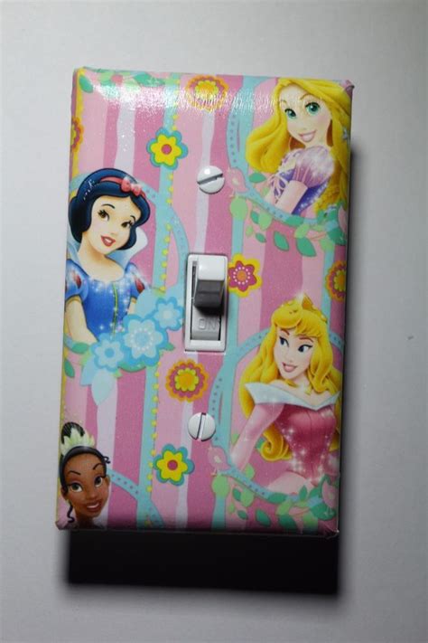 A disney removable wall decal is a bedroom decorating idea your little princess mona would love! Disney Princess Light Switch girls child kids room home ...