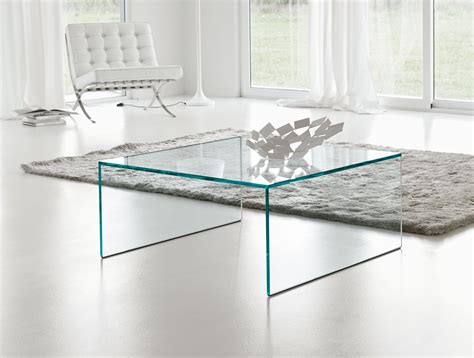 It lets you create a warm and inviting look with your favorite decor, collectibles, potted plants etc. Square Acrylic Coffee Table | Roy Home Design