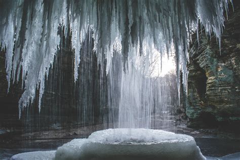 Magical View Inside Of A Partially Frozen Waterfall