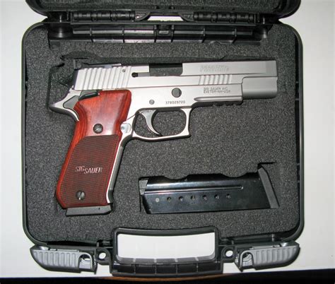 Sig P220 King Of The Autos Sig Sauer Elite Stainless Swat Survival