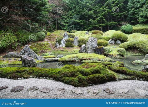 Peaceful Japanese Zen Garden With Pond Rocks Gravel And Moss Stock