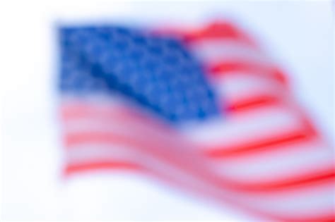 American Flag On Blurred Background Free Photo