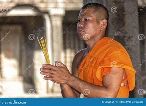 Young Praying Buddhist Monk In Angkor Wat Cambodia Editorial