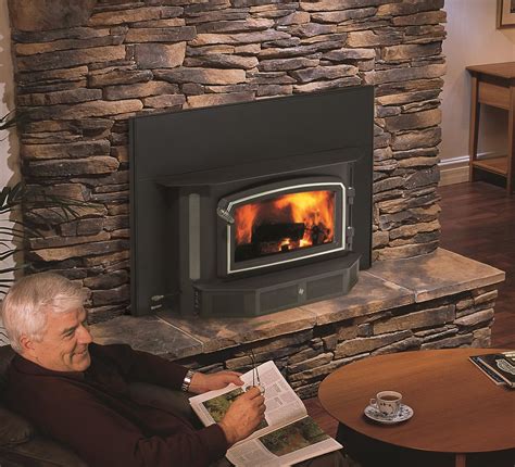 Inserts are usually made from plate steel or cast iron and have glass doors through which the flames can be seen. Wood Inserts - Classic I3100 - Kastle Fireplace