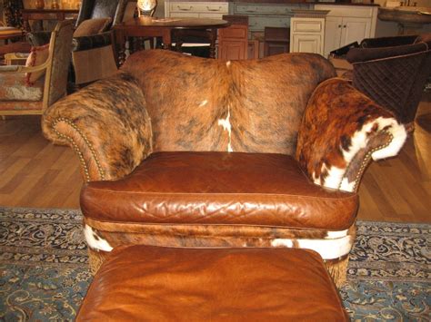 Relax in style thanks to the flare tapered arms that help bring an elegant, sophisticated appeal to the overall simple appearance. Hunting lodge furniture, hair hide and twisted leather ...