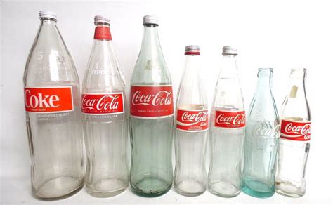 Lot Of 7 Different Vintage Coca Cola Glass Bottles 1980s Antique