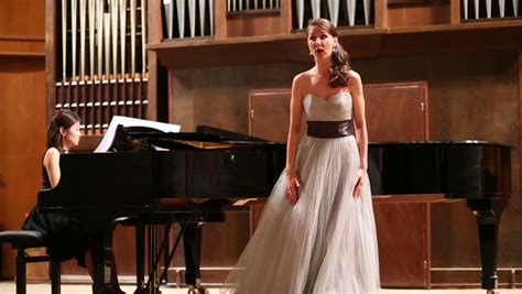 Woman Pianist Plays The Piano And Beautiful Singer Emotionally Sing