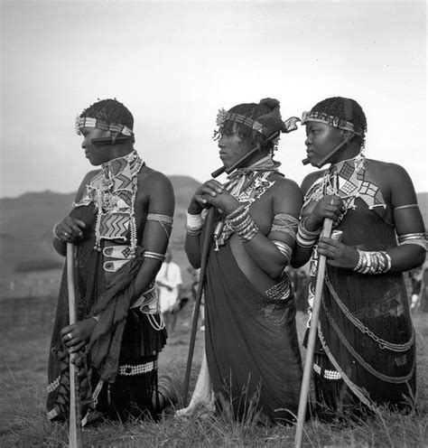 Three Zulu Women 1949 They Are Kneeling Side By Side In The Grass Looking To Their Right They