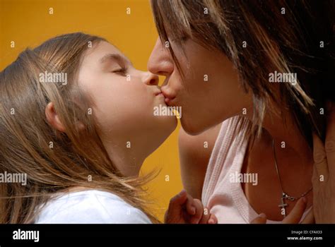 Kissing Mother And Daughter