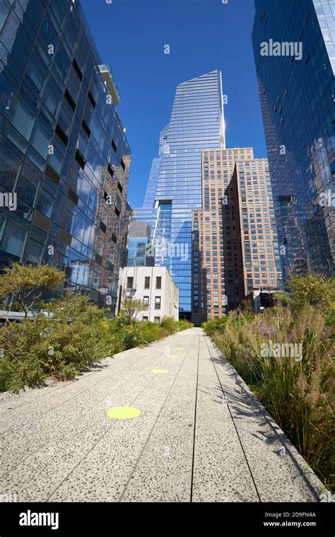 Walkway Flanked With Buildings In The High Line Park In New York City