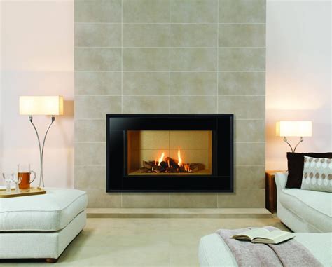 Glass tiles have different patterns and shapes, creating a calm look of the space. 19 Stylish Fireplace Tile Ideas for Your Fireplace Surround