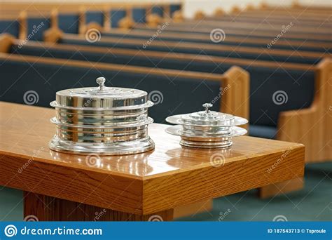 Communion Trays On Table Before Empty Church Pews Stock Image Image