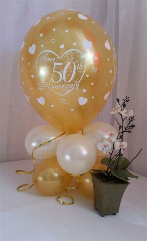Helium filled balloon deliveries for birthdays and sweet cheesecake are one of the most popular ways to celebrate. 50th Wedding Anniversary Balloon Table Decoration by ...