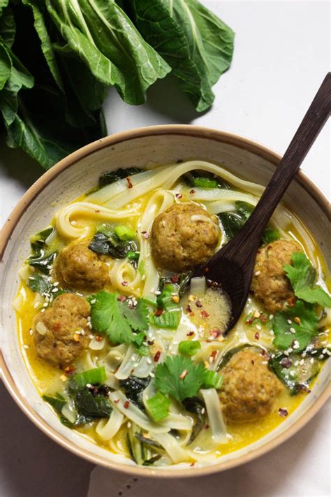 Healthy whole30 thai noodle salad with chicken, peanut sauce, and kale. Thai-Inspired Meatball Soup with Rice Noodles - The ...