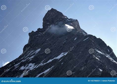 Summit Of Matterhorn Mountain Covered By Small Cloud Stock Image