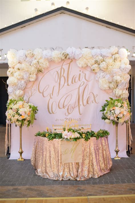 Sweetheart Table Backdrop With Large Gold Calligraphy Monogram Rose