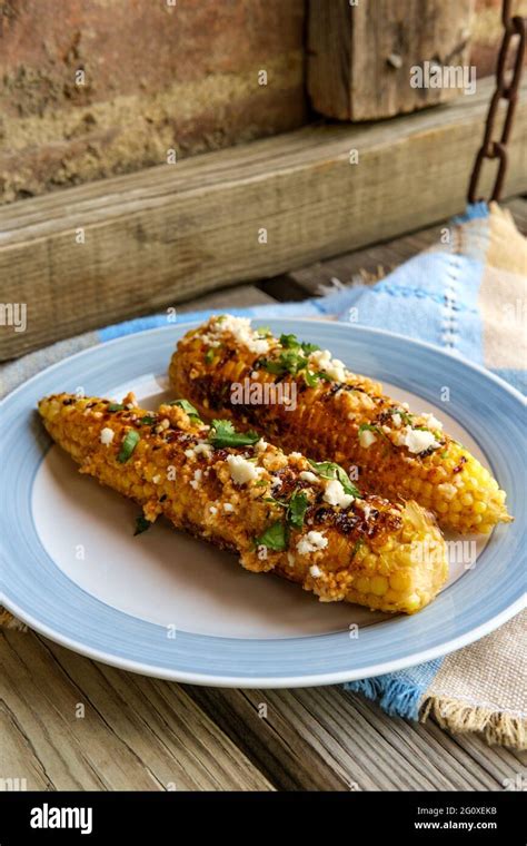 Mexican Street Corn Also Known As Elote Served With Chili Mayonnaise