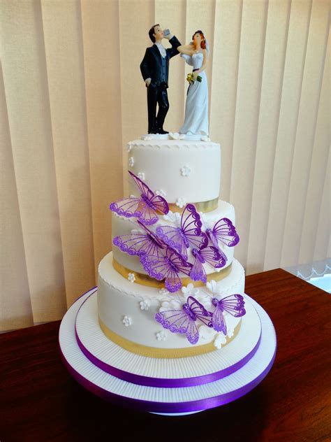 From napkin rings, brooches and fashion to diy ideas to make your day spectacular!. Ivory & Purple Butterfly Theme Wedding Cake xMCx | Themed wedding cakes, Wedding cakes ...