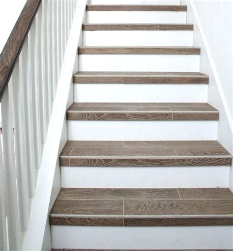 Although border tiles usually go on the walls, you could consider making them a part of your staircase design. Porcelain Tile Staircase Ceramic Tile Stair Nosing Home ...