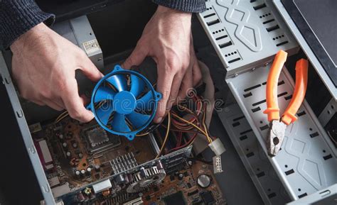 Man Repairs Cooling System Of Computer Stock Photo Image Of System