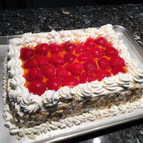 Homemade Strawberry Cake With Whipped Cream Frosting And Fresh
