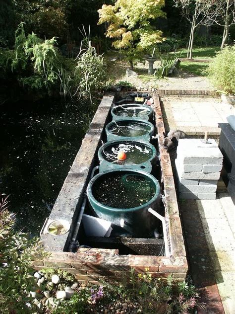 Not different than regular aquarium filters, but of course with higher capacity. Koi Pond Filter System Designs - HOUSE EXTERIOR AND ...