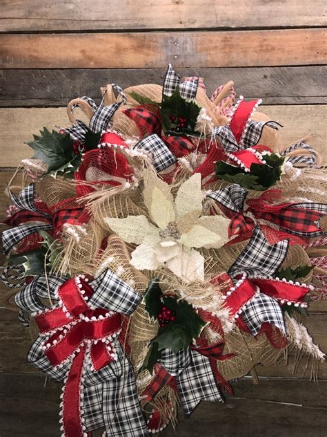 Window wreaths can be homemade or commercially manufactured, and they can be artificial or constructed from natural foliage and decorative materials. Christmas Wreath, Holiday Wreath, Rustic Holiday Wreath ...