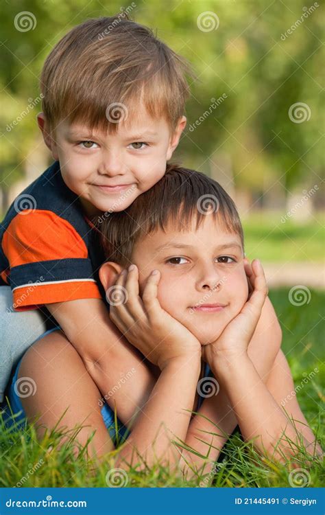 Two Happy Brothers On The Grass Stock Image Image Of Glad Caucasian 21445491