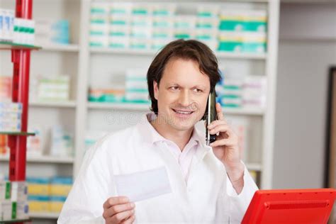 Pharmacist On Call In A Pharmacy Stock Image Image Of Front Document