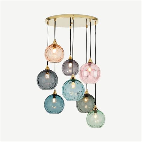 Five Different Colored Glass Balls Hanging From A Light Fixture