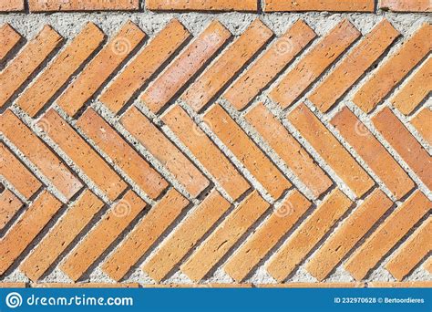 Herringbone Brick Pattern Wall With Cement Pointing Stock Photo