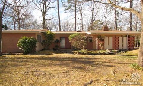 As seen in many brick homes, this house has a cozy. Warm and beautiful 1962 mid-century modern brick ranch ...