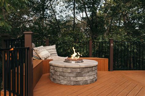 How to build a safe fire pit on a wood deck the. Composite Deck with Built-in Stone Fire Pit