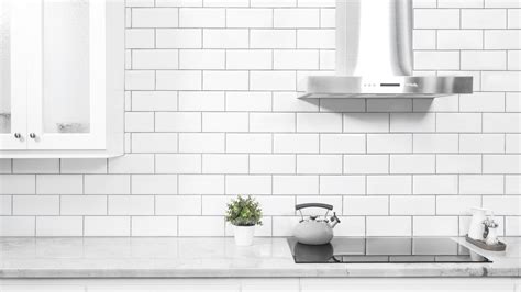 Buckingham tiles are rectified tiles which means the edges are very straight and grout lines can be very narrow. Traditions 4" x 10" Wall Tile in Ice White | White wall ...