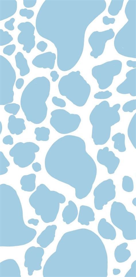 Download A Unique Blue And White Cow Print Wallpaper