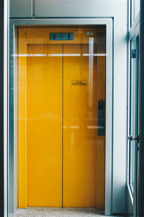 Closed Yellow Elevator Door · Free Stock Photo