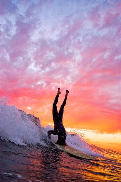 summer sunsets pink sky headstand surf surfer surfing waves surfboard wetsuit sports