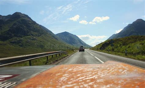 View From The Car On Scottish Highlands Landscape In Summer Editorial