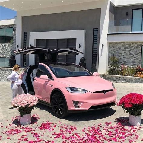 A good gift is a gift that someone loves. Luxury | Lifestyle | Wealth on Instagram: "Pink Tesla gift ...