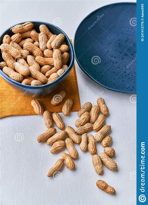 Image Of Bunch Of Peanuts In A Bowl On A Table Stock Photo Image Of