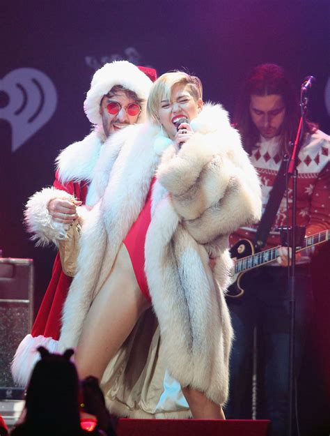 Miley Cyrus Got Saucy With Santa As Mrs Claus At Jingle Balls Saint