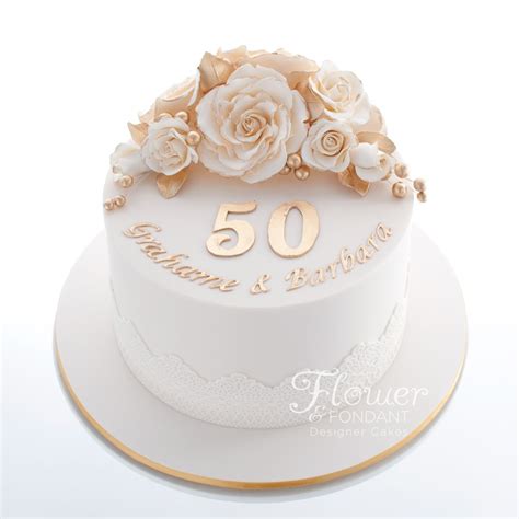 Single Tier Ivory And Gold 50th Anniversary Cake Adorned With Ivory