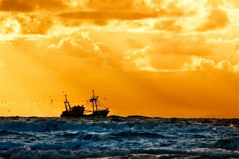 Fisherboat On High Seas Water Nature Sunset Waves Clouds Sea Hd