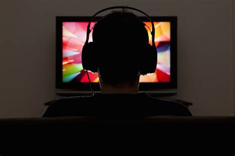 A Man Wearing Headphones And Watching Television Techcrunch