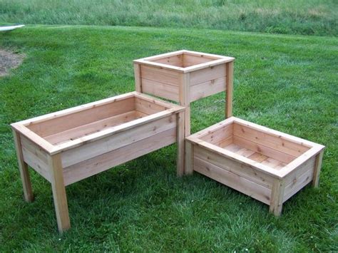 Also known as a raised planter box, but i like the term elevated because it is on. Maybe... | Pallet garden box, Garden boxes, Vegetable boxes