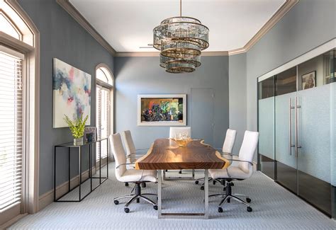 All the furniture arranged and combined in a minimalist style office interiors are beautiful and comfortable. Jacksonville Beach | Studio M Interior Design