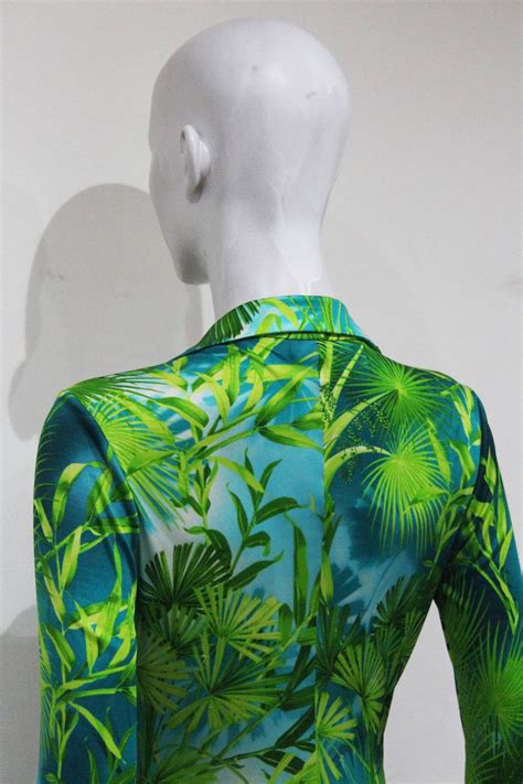 In 2000, google search results were only limited to simple pages with text, but then people started searching for, 'jennifer lopez's green dress,' and google realised. Gianni Versace jungle print silk jersey low plunge dress ...