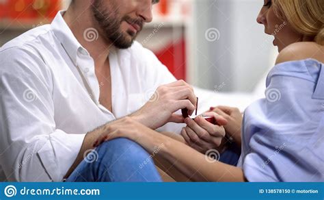 Boyfriend Presenting Lady Precious Golden Engagement Ring On St Valentines Day Stock Photo